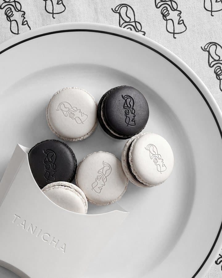 TANICHA monogram macarons on a plate